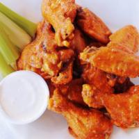 Mth Wings -6- · Crispy fried jumbo chicken wings | Choose from our house made sauces and dressings.  All ord...