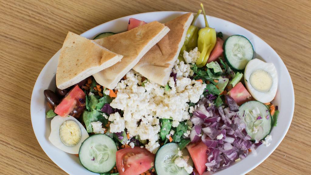Greek Salad · With feta, red onions and kalamata olives.