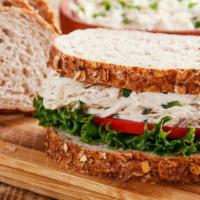 Chicken Salad Sandwich · Customer's favorite sandwich made with toasted bread, chicken salad, lettuce, tomatoes, and ...