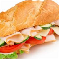 Turkey Sandwich · Fresh baked bread, sliced turkey, lettuce, tomatoes, pickles, mayonnaise, and swiss cheese.