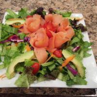Smoked Salmon Salad · Smoked salmon salad made with lettuce, tomatoes, olives, pickles, black pepper, vinegar, and...