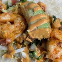 Taco: Camaron///Shrimp · Grilled Shrimp served on a flour tortilla, topped with lettuce, tomato, cheese, avocado, and...
