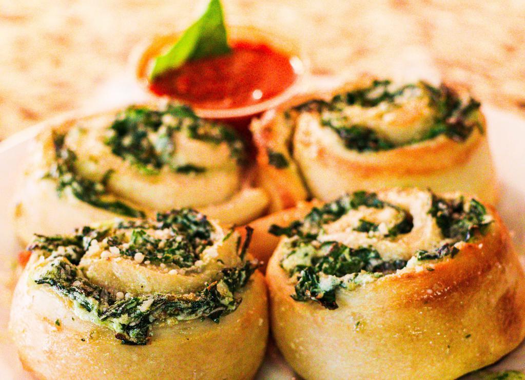 Spinach Pin Wheels · Mozzarella, ricotta, Parmesan cheese mixed with fresh spinach rolled into mini pizza rolls
