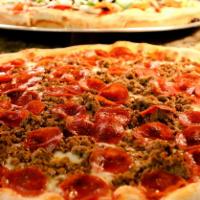 Meat Lovers · Pepperoni, Bacon, Sausage, and Ground beef.