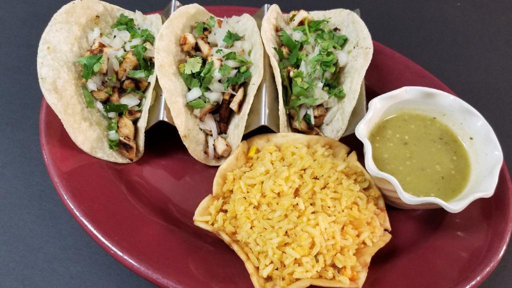 Street Tacos · 3 soft corn tortillas with cilantro and onions. Choice of carne asada, chicken carnitas, pastor chorizo, beans or rice.