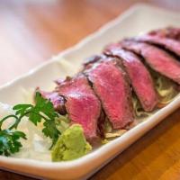 Beef Tataki · Seared raw seasoned beef with special sauce.

Advisory: consuming raw or uncooked meats, pou...