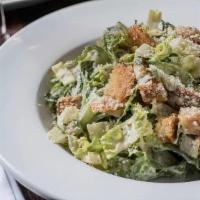 Large Caesar Salad · Fresh chilled romaine, caesar dressing, parmesan cheese, frico, homemade croutons.  Add Chic...