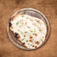 Naan Bread · Indian Bread made with white flour and cooked in Indian clay oven.