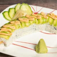Dragon Roll · 8 pieces. Shrimp tempura with spicy mayo, eel sauce and avocado on top.