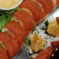 Mafia Roll · Raw. Tempura shrimp, cream cheese, avocado, and asparagus topped with spicy tuna.

Consuming...