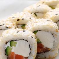 Philadelphia Roll · Seared salmon, cream cheese, avocado, scallions top with sesame seeds.