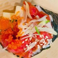 Spicy Tuna Hand Roll · Spicy tuna, cucumber, avocado, masago.