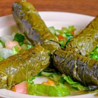 Warak Inab (Stuffed Grape Leaves) · 4 or 8 grape leaves stuffed with seasoned rice and finely chopped beef.