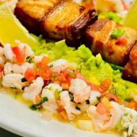 Holy Moly Guacamole · jumbo crab meat + chicharrones. fresh wild caught lobster + tequila lime shrimp