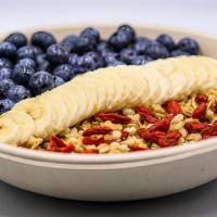 Scottie Bowl · Acai, almond milk, banana, strawberry, blueberry, raspberry, peanut butter topped with goji ...