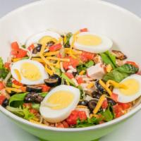 Protein Gourmet · Spring greens tossed with turkey, chicken, eggs, mixed cheeses, tomato and black olives in a...