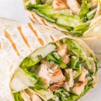 Chicken Caesar Wrap · Crisp romaine leaves, hormone-free chicken, parmesan cheese and crunchy croutons with caesar...