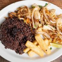 Vaca Frita De Pollo · Shredded Chicken grilled to a crisp, with sauteed onions