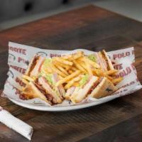 Club Sandwich · Ham, cheese, turkey, bacon, mayo, lettuce and tomatoes  served with French fries.