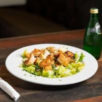 Caesar Con Camarones · Fresh Romaine lettuce, parmesan cheese, croutons and creamy Caesar dressing with grilled shr...