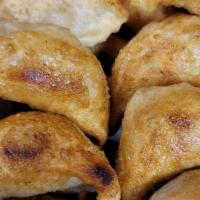 Peking Fried Dumplings (6Pc) · Original Chinese dumplings filled with ground pork and Chinese spices.