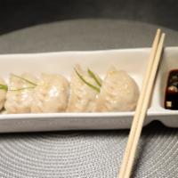 Steamed Dumplings (6) · Original Chinese dumplings filled with ground pork and Chinese spices.
