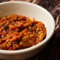 Spicy Baked Beans (Chakalaka) · Our signature vegetarian beans in tomato sauce  cooked with  bell peppers, onions, carrots, ...