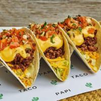 Beef & Queso Tacos · 3 tacos with spiced ground beef, queso cheese sauce, shredded cheese, lettuce, pico de gallo...