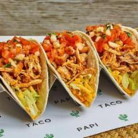 Chicken Tinga Tacos · 3 tacos with chicken tinga, shredded cheese, lettuce, pico de gallo and your choice of sauce.