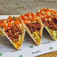 Beyond Meat Tacos · 3 tacos with plant-based Beyond Meat, cheese, lettuce, pico de gallo and your choice of sauce.