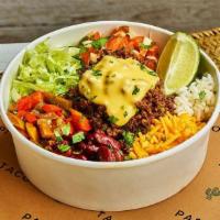 Beef & Queso Bowl · Spiced ground beef with rice, queso cheese sauce, shredded cheese, spiced fajita veg, beans,...