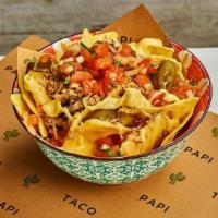 Pork Carnitas Loaded Nachos · Crispy corn tortilla chips with pulled pork, shredded cheese, queso, pickled jalapeno, cilan...