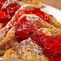 Strawberry Or Plain French Toast · Three pieces of French Toast crowned with strawberry topping and powdered sugar (Cal 640)