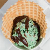 Magnetic Mint Ice Cream · Mint and fudge ice cream with Oreo's and Andes mints in a waffle bowl