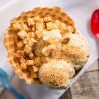 Key Lime Voltage Ice Cream · Lime and cheesecake ice cream with graham crackers and cheesecake bites in a waffle bowl.  C...