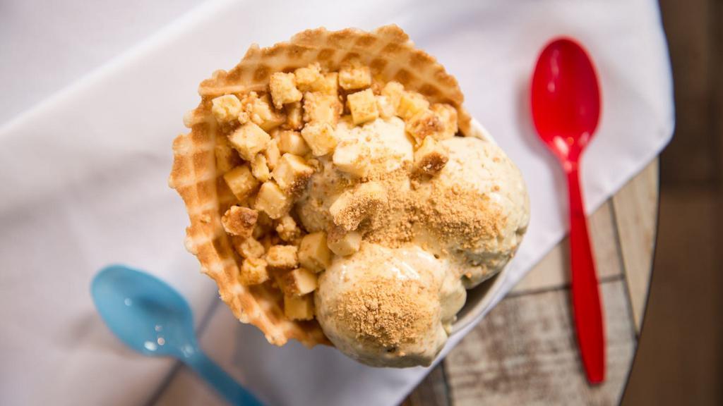Key Lime Voltage Ice Cream · Lime and cheesecake ice cream with graham crackers and cheesecake bites in a waffle bowl. Citric acid optional.