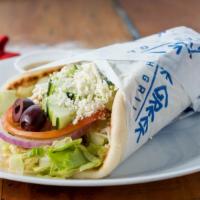 Veggie Pita · Vegetarian. Hummus, Lettuce, tomatoes, onions, cucumbers, olives, feta cheese, and a side of...