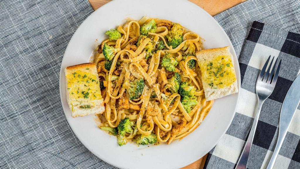 Cajun Pasta · Served with salad and garlic bread. Our homemade creamy Cajun sauce with fettuccine pasta and fresh broccoli.