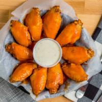Boneless Chicken Wings · Served with blue cheese and ranch dressing.