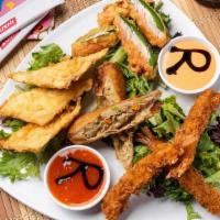 Appetizer Sampler · All of our most famous Opening Acts on one plate. Crispy wontons, jalapeño poppers, TNT shri...