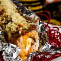 Tour Bus Roll · Spicy tuna, crab stick, and cream cheese. Topped with seared filet mignon, jalapeños, spicy ...