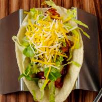 Chicken · Fried chicken served on six inch corn tortilla with lettuce, sesame sauce, cheese, cilantro.