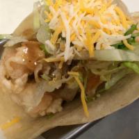 Shrimp · Fried shrimp served on six inch corn tortilla with lettuce, sesame sauce, cheese, cilantro.