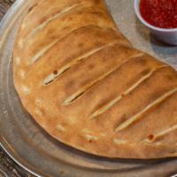 Vegetarian Calzone · Green peppers, onions, mushrooms, black olives, and tomatoes.
Vegetarian.