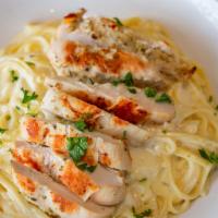 Chicken Alfredo · Fettucini pasta and our marinated grilled chicken tossed in alfredo sauce.