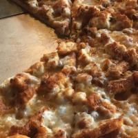 Buffalo Chicken Pizza · Original crust pizza topped with fried chicken tender strips tossed with blue cheese, spicy ...