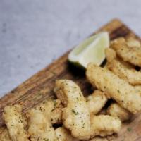 Deditos Rebosados · Corn flake encrusted fish fingers with a roasted pepper aioli.