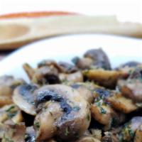 Champis Al Ajillo · Mushrooms sautéed on garlic and olive oil