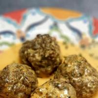 Albondigas Bravas-Spicy Meatballs · Homade meatballs cooked in a spicy sauce.