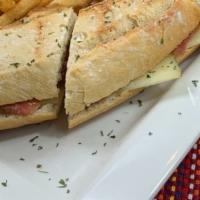Bocadillo La Primera · Spanish Sandwich with Aged serrano ham, cantimpalo, manchego cheese with EVOO.